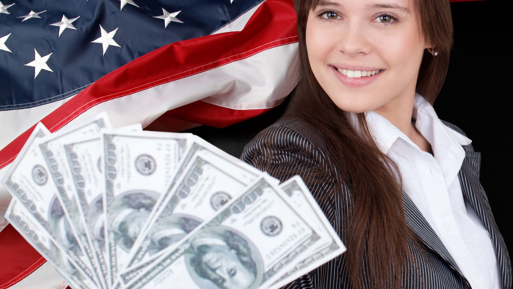 Woman holding the Tax Refund money with an American Flag