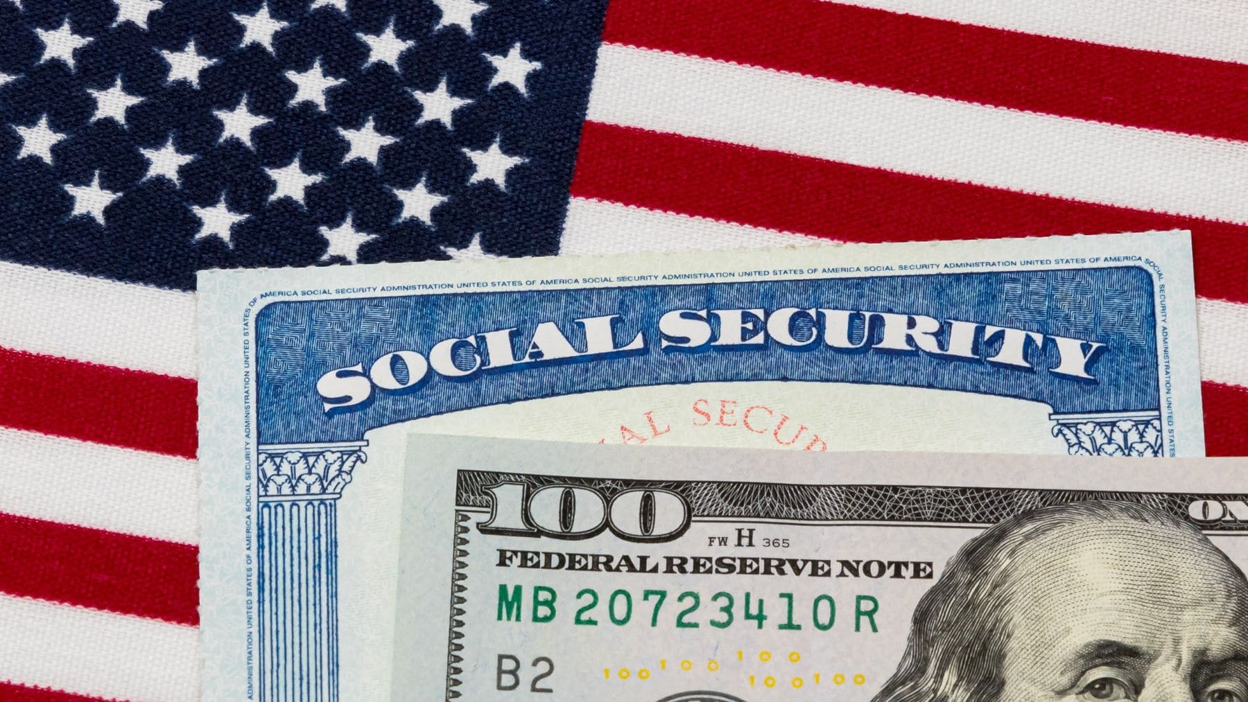American flag with Social Security money and card
