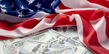 An American flag covering the Social Security money