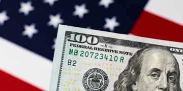 American flag with a bank note from the SNAP benefit