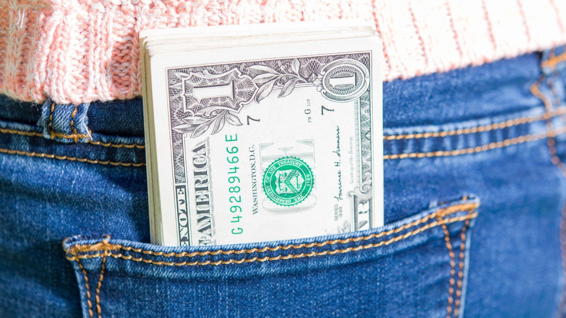 A Social Security payment inside a pocket