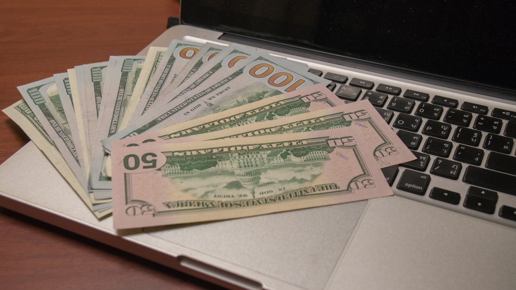 Money on a laptop