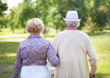 A retirement couple walking