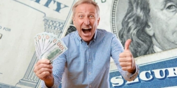 A happy Senior with money from Social Security pension