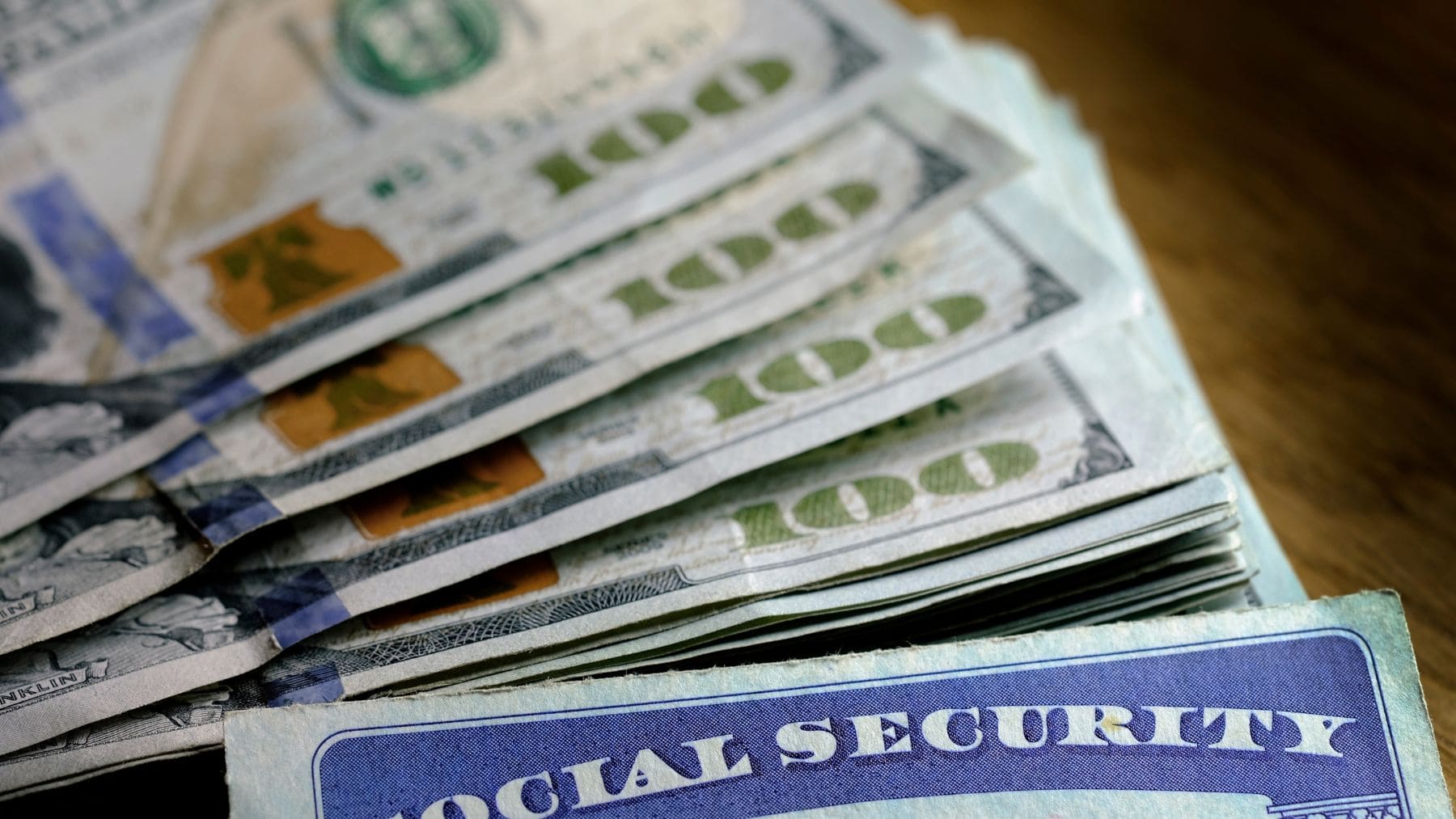 Social Security Disability Income card and dollars