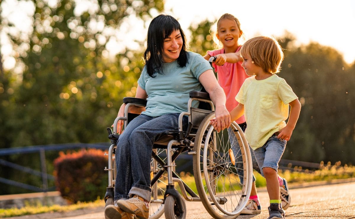 A woman with a disability and two children