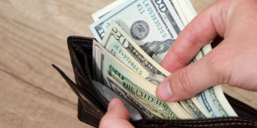 Supplemental Security Income money in a wallet