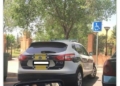 Multan con 800 euros a una mujer que fotografió un coche de policía en una plaza de PMR