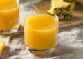 Jugo naranja y piña para bajar los triglicéridos