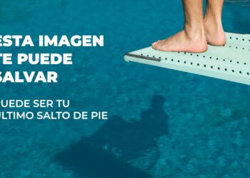 Cartel Campaña: zambullidas hombre en trampolín y sombra de una silla de ruedas